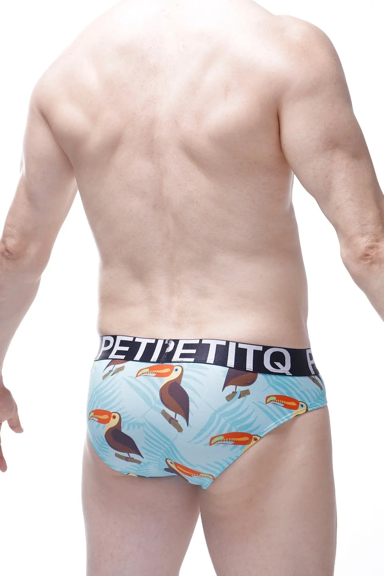 Light blue men’s briefs with playful toucan print and black petit etiq branded waistband in Brief Chill Toucan design