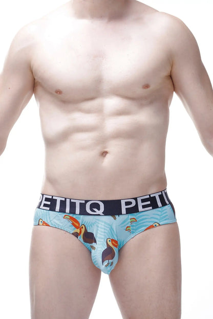 Light blue men’s briefs with playful toucan pattern and black petitq branded elastic waistband brief chill toucan