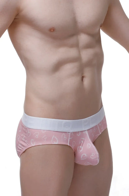 Brief dome løve pink patterned briefs with white waistband and matching pouch featuring subtle heart designs