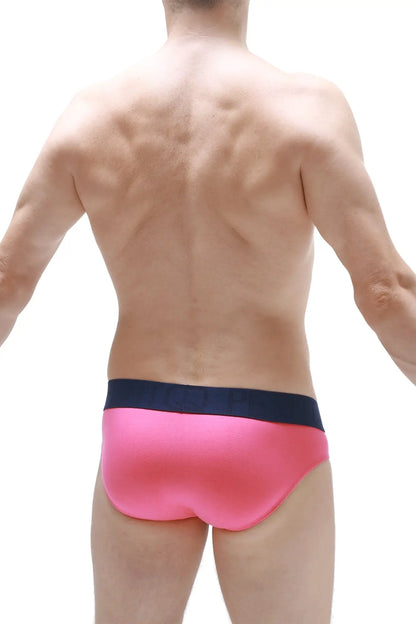 Brief matraux fuchsia bright pink swim trunks with contrasting navy blue waistband for beachwear