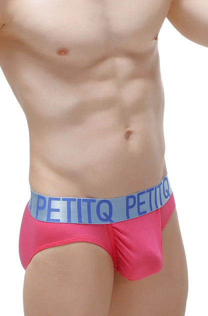 Bright pink brief taik modal fuchsia men’s briefs with light blue elastic waistband and bold brand name
