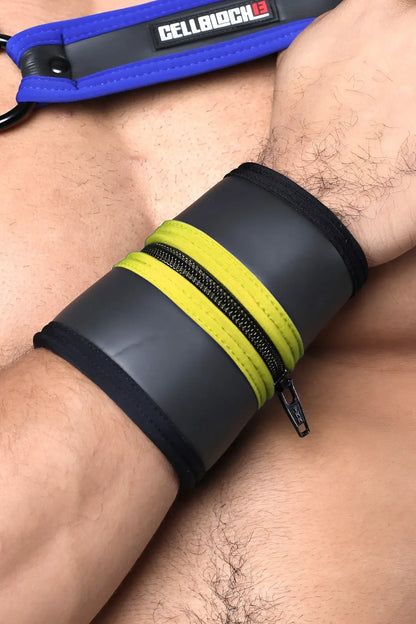 Buckle Up cuff wrist cuff with black and neon yellow zipper and blue cellblock branded strap available in 5 colors