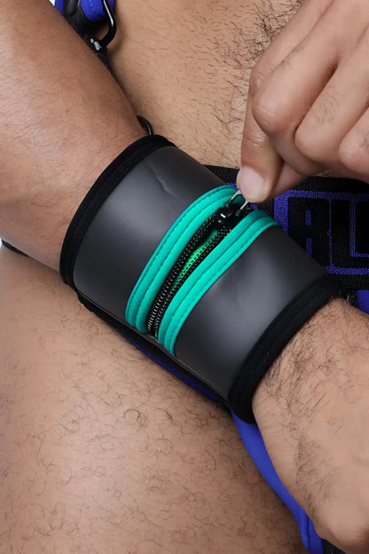 Black buckle up cuff wristband with teal zipper accents designed for style and secure fit available in five colors