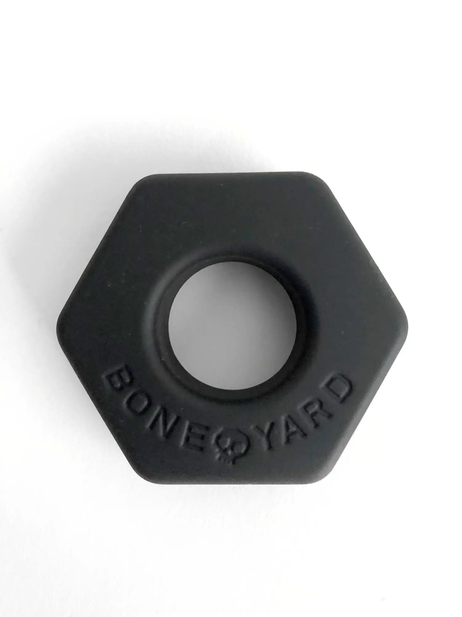 Black hexagonal silicone ring bust a nut with bone yard embossed around the center for comfortable everyday wear