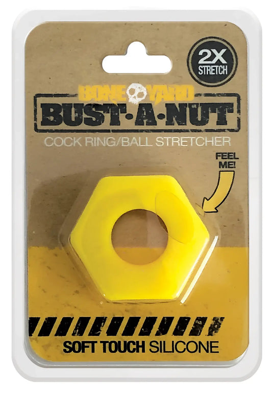 Bright yellow hexagonal silicone ring with central hole packaged in cardboard and plastic for bust a nut product