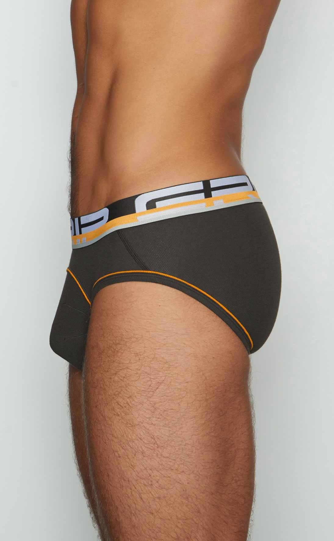 Black c-in2 brief 3313-068 with bold white and yellow striped waistband and orange stitching on the leg openings