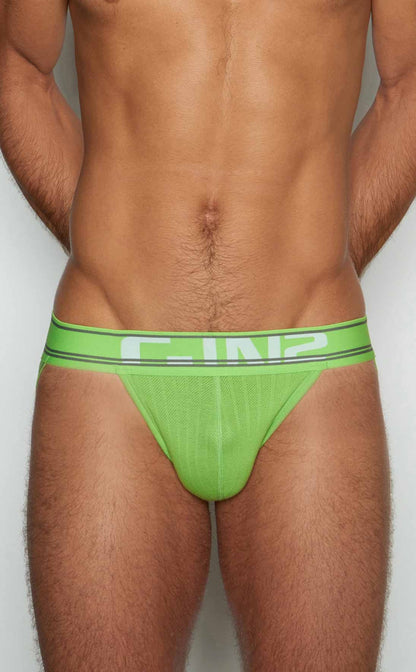 Bright green c-in2 jockstrap briefs with mesh front and elastic waistband showcasing breathable design