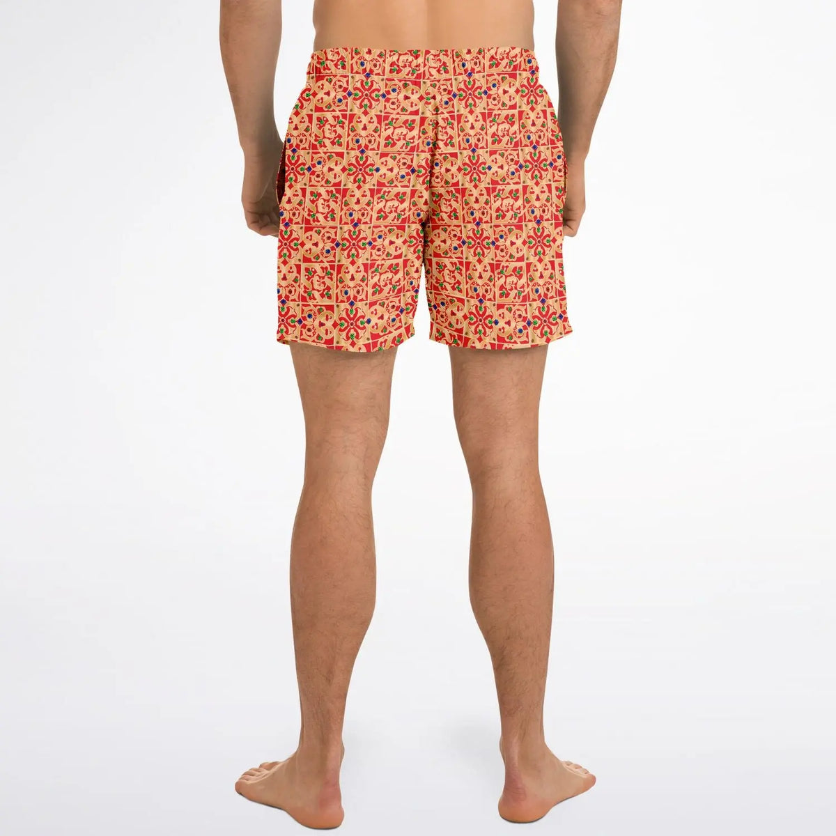 Men's swim shorts in a vibrant red and yellow floral pattern made by Maris Equi shown from the back.