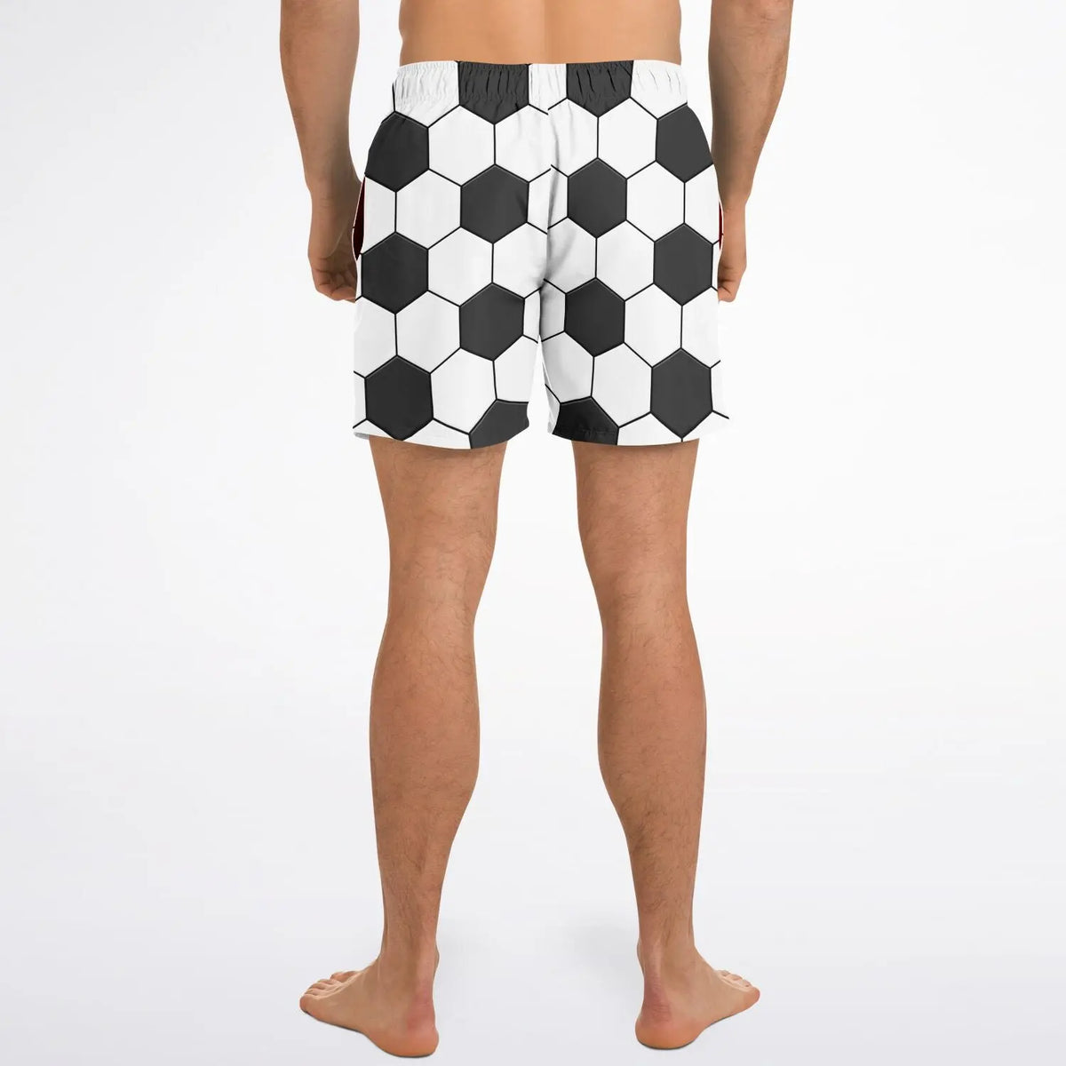 Men's swim shorts by Maris Equi featuring a black and white hexagonal pattern elastic waistband and above-the-knee cut.