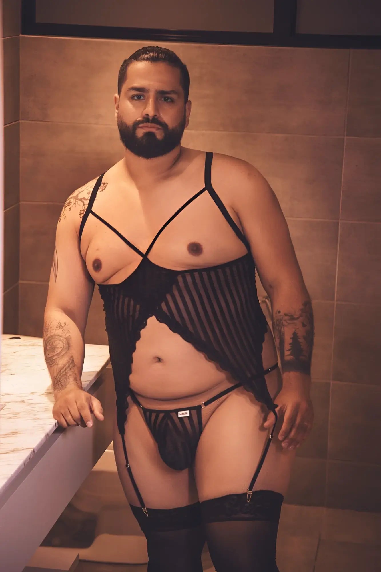 Black lace bodysuit with suspenders and matching thong from candyman 99654x mesh two piece set in black shown from back