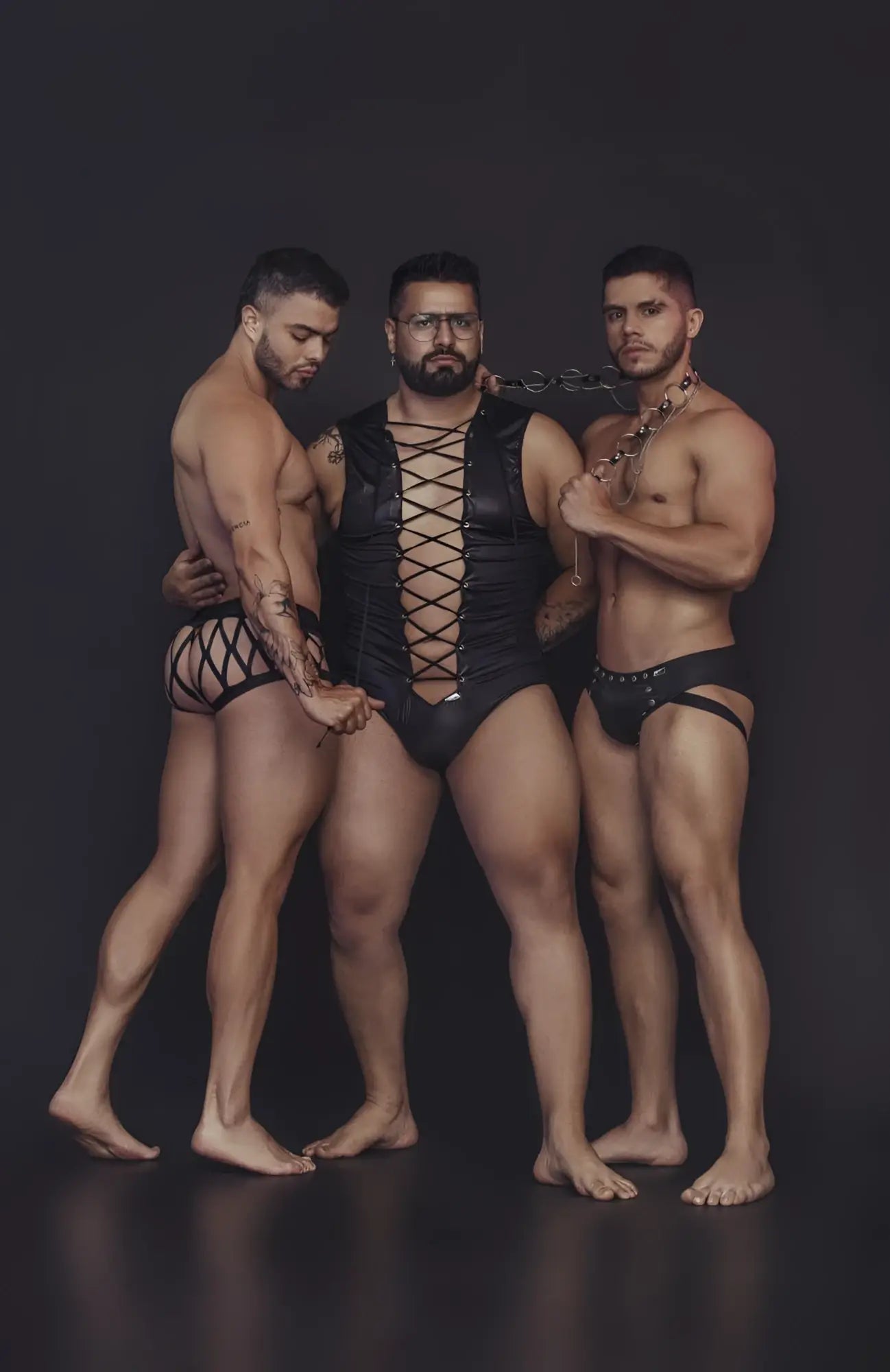 Black leather CandyMan 99691 cage trunks featuring a corset style with crisscross lacing and central front panel