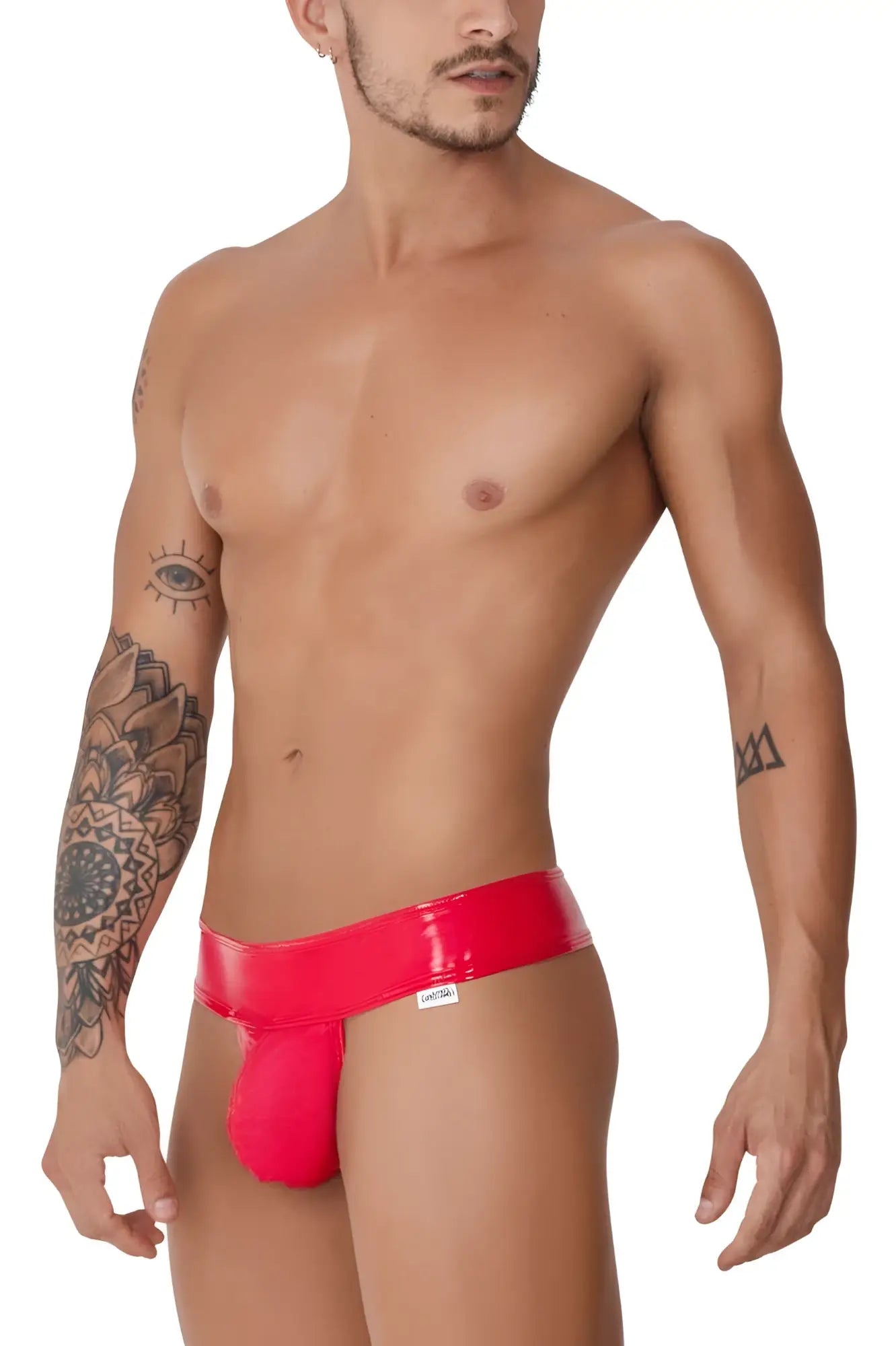 Red patent leather briefs with a sleek glossy finish and a white brand tag on the waistband from candyman