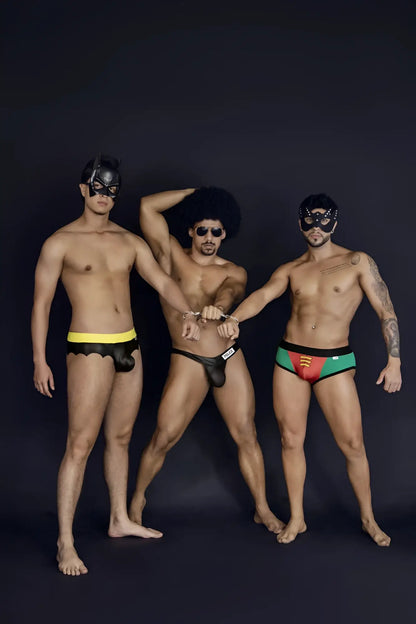 Black shiny batman-themed swim trunks with yellow waistband candyMan 99912 police thongs color black