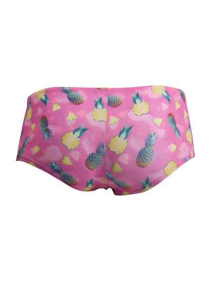 CandyMan 99922 pink swim trunks featuring a vibrant yellow pineapple pattern with green tops on bright pink fabric