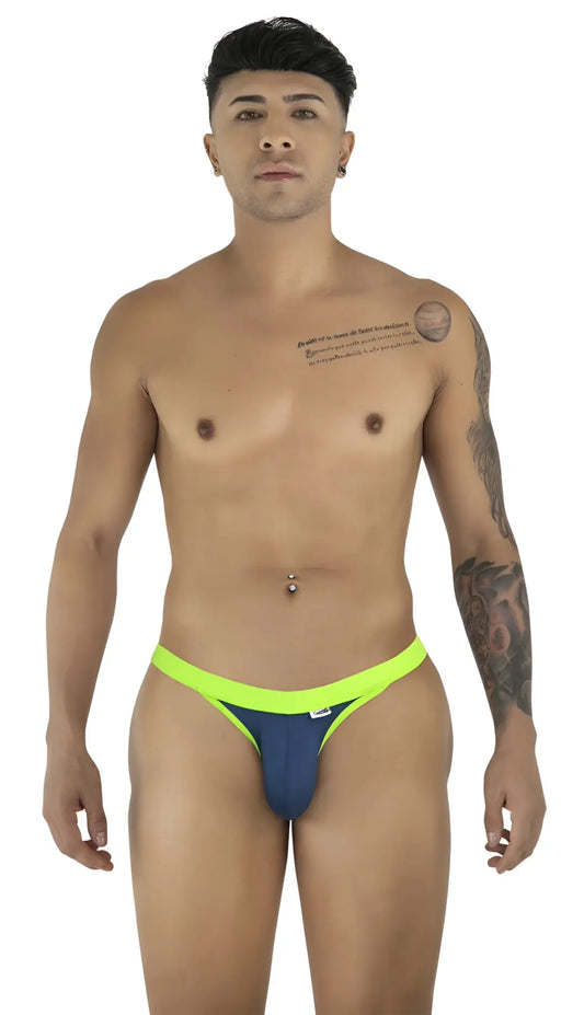 Model wearing CandyMan 99941 navy bikini with a bright lime green waistband and minimalist cut.