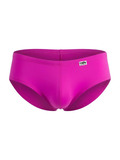 Magenta CandyMan 99943 trunks with a fitted contour pouch, smooth fabric, and brand logo label on the front right.