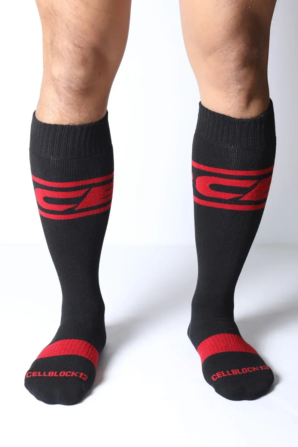 Black knee-high socks with red stripes and logo featuring a snug fit by CellBlock 13