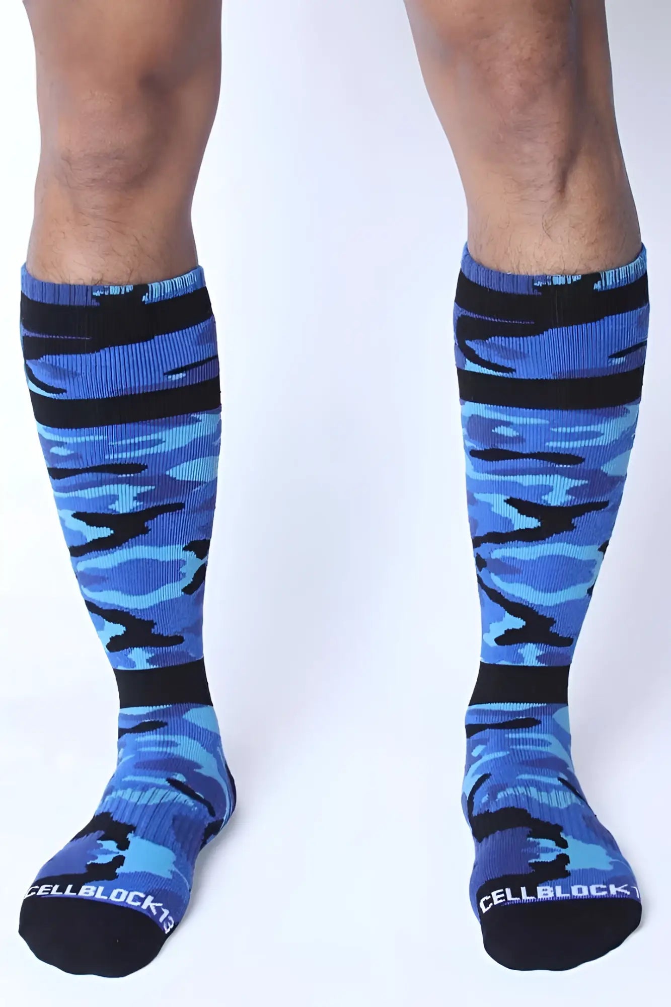 Blue and black camouflage knee-high socks with cellblock branding on the toe in size one size