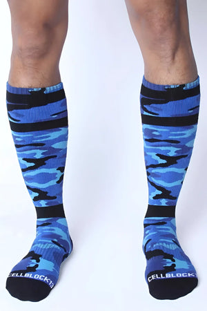 Blue and black camouflage knee-high socks with cellblock branding on the toe in size one size