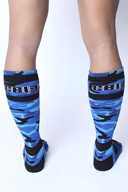 Blue and black camouflage knee-high cellblock 13 foxhole socks with cbi branding on the cuff size one size