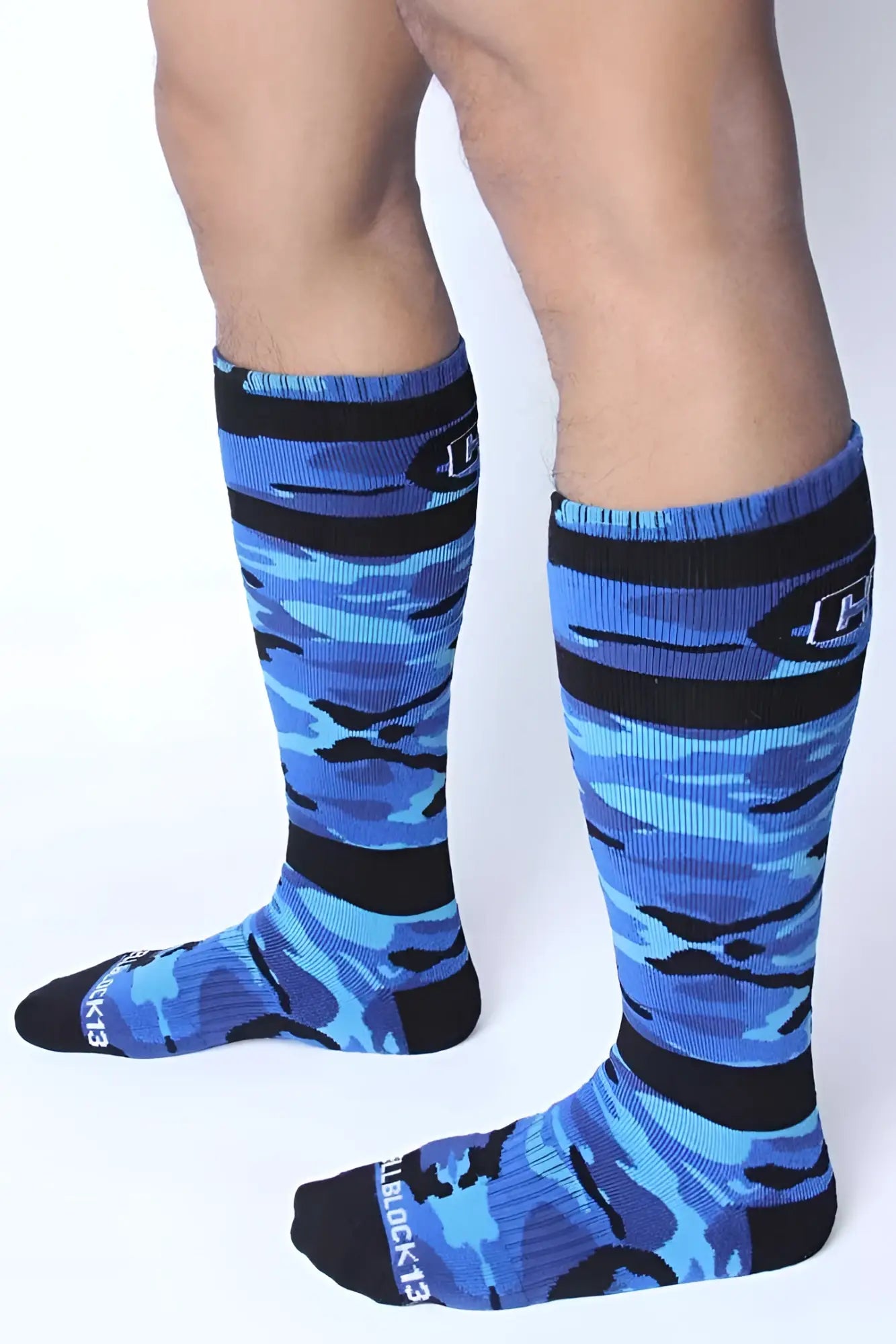 Cellblock 13 foxhole knee-high socks in blue and black camouflage with ribbed texture and reinforced toe and heel areas