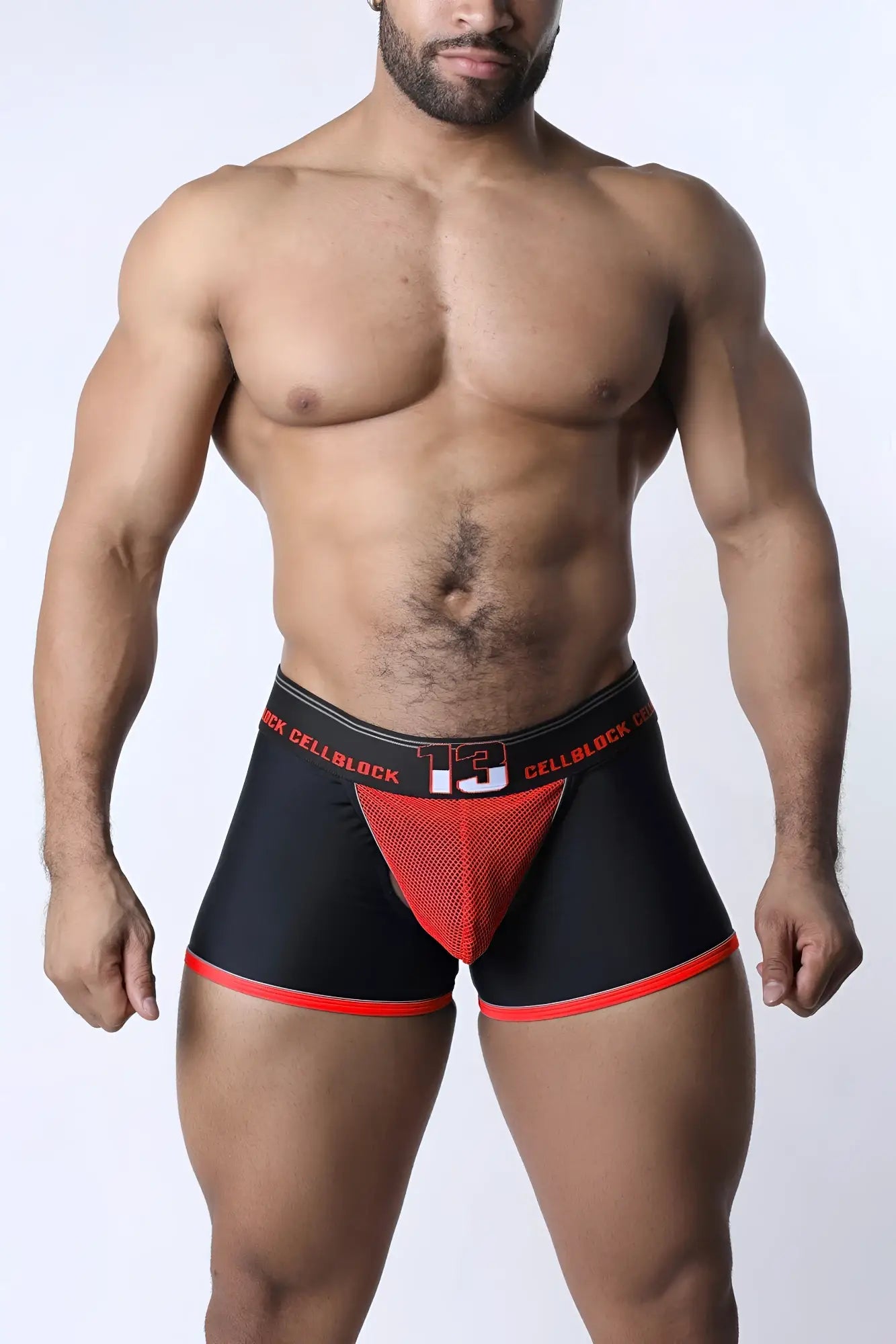 Black and red chain reaction jock trunk men’s briefs with a mesh panel and cell block design