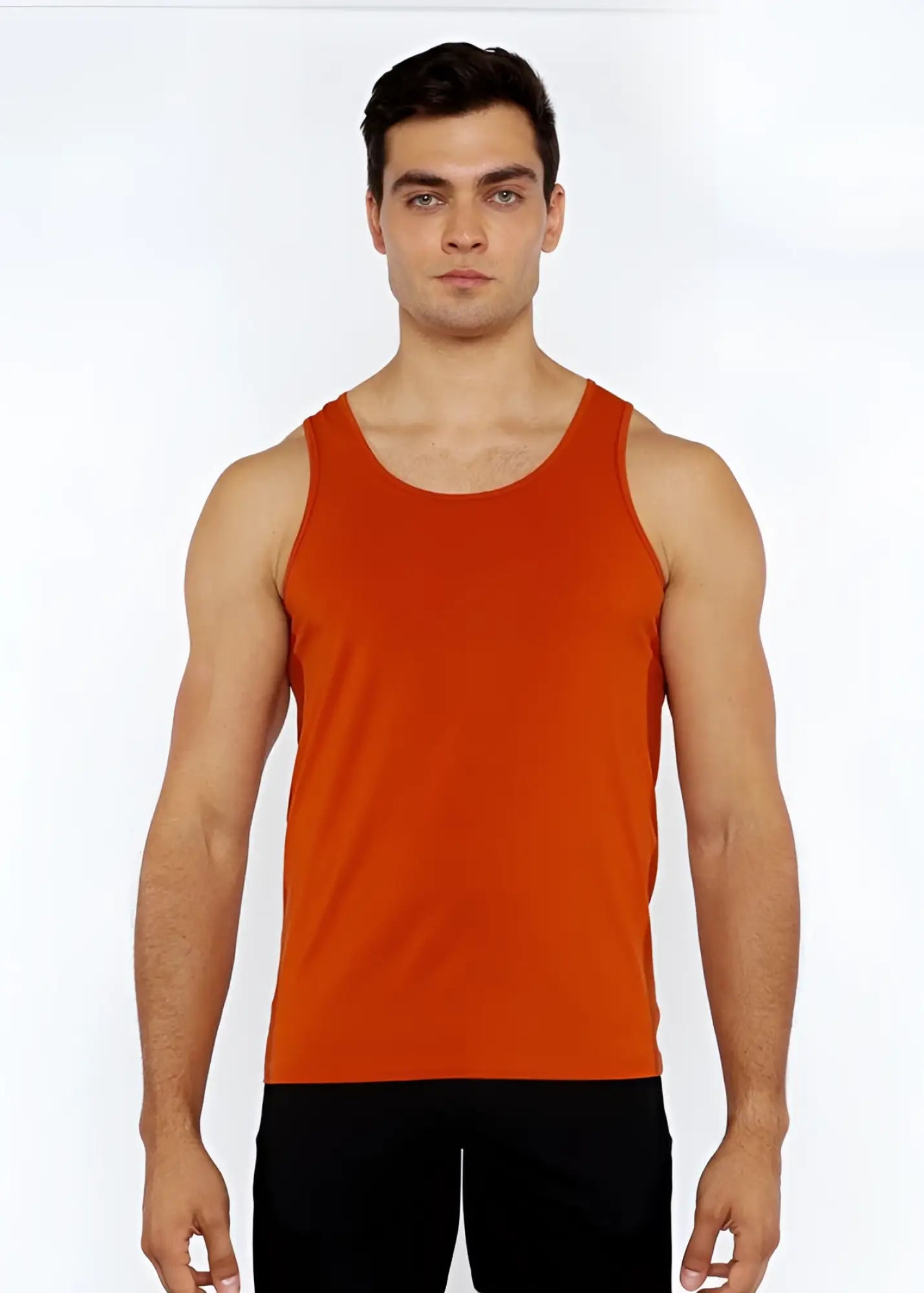 A solid orange sleeveless stretch jersey tank top with circle spine laser cut and a simple round neckline