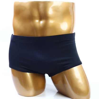 Navy blue metroMalewear classic bodybuilding swim trunks displayed on golden mannequin torso front view