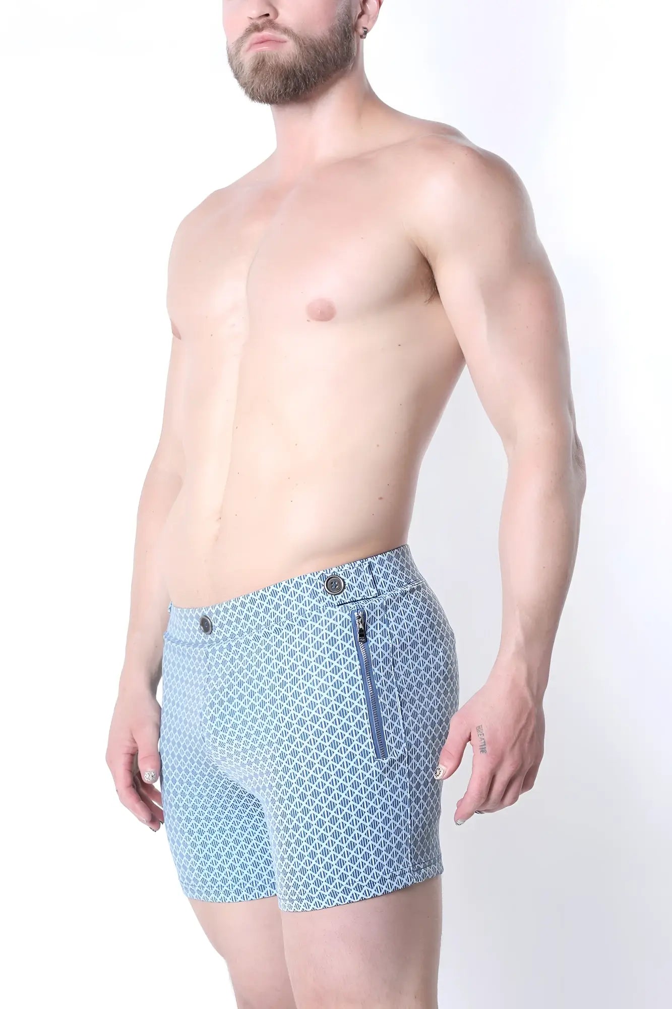 Light blue clemente swim short with subtle geometric pattern and matching zipper detail limited edition</user