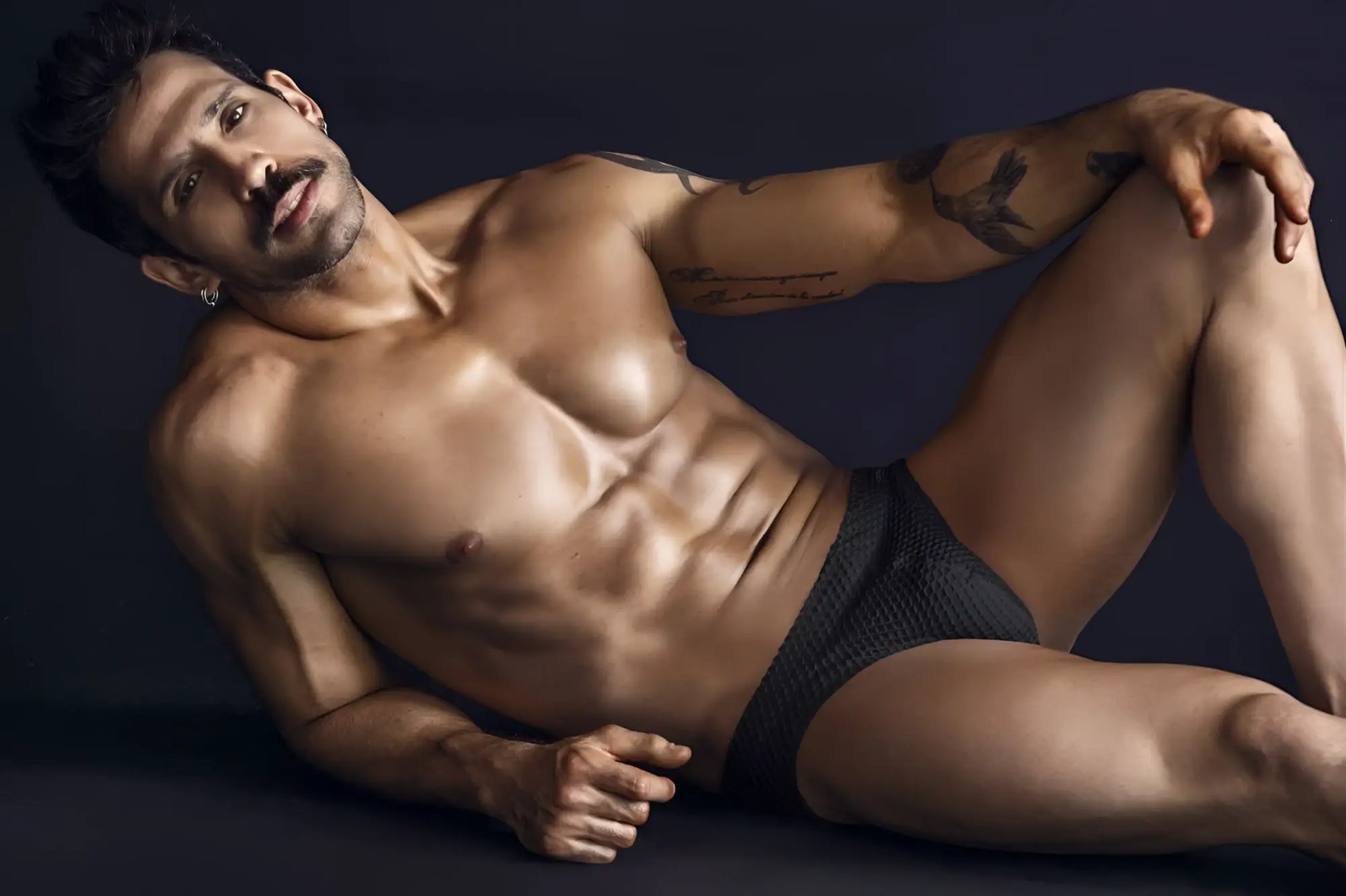 Black textured clever 1743 island swim briefs showing front design for swimming and beachwear use