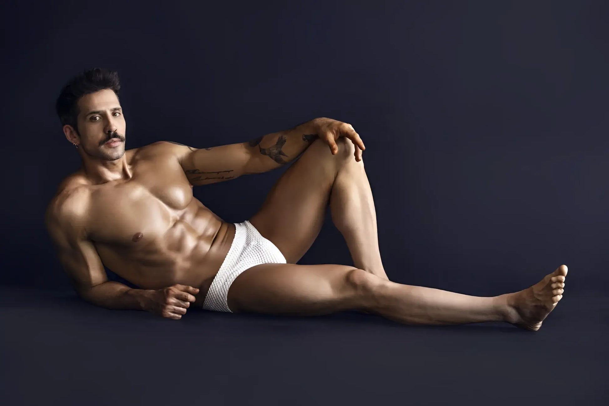 White textured clever 1743 island swim briefs featuring breathable fabric for comfortable swimwear use