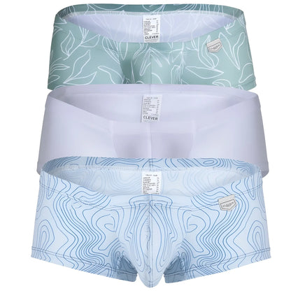 Set of three clever men’s briefs in mint green leaf, solid white, and blue topographic line designs for everyday wear