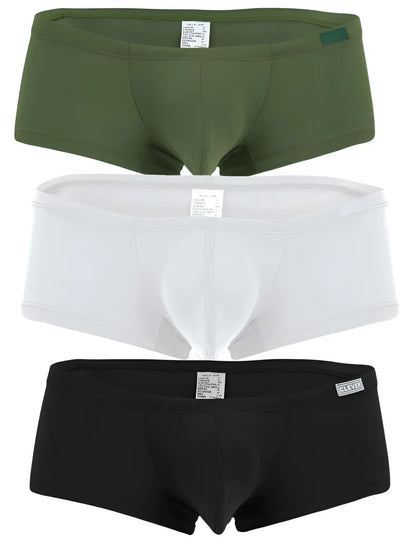 Three pairs of clever australian latin trunks in olive green white and black made from soft breathable fabric