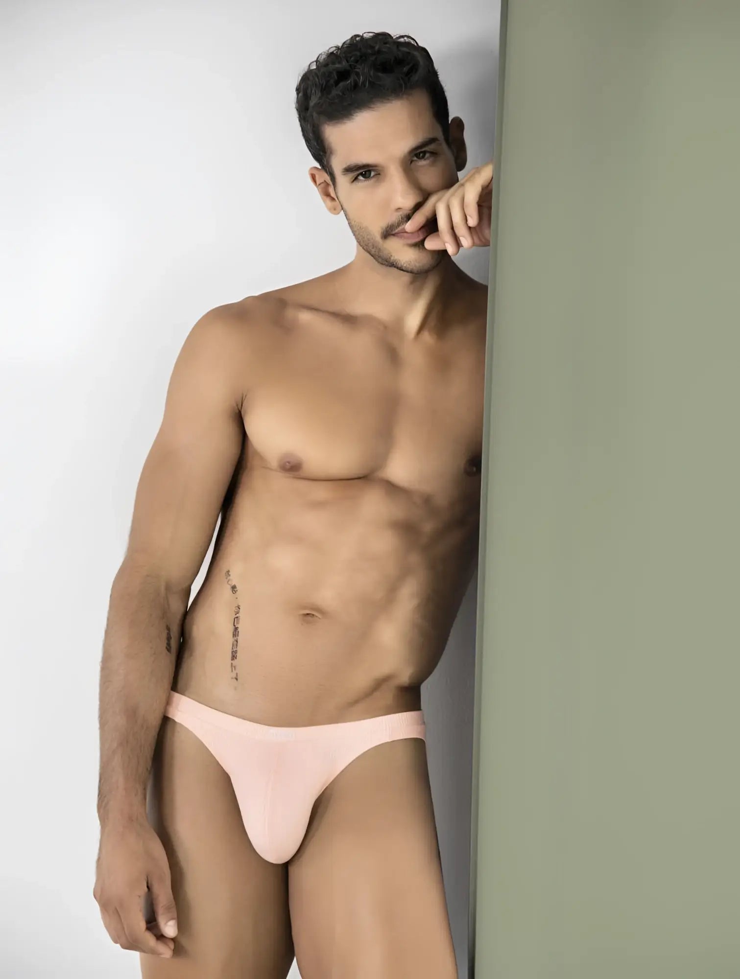 Pink ribbed briefs in vibrant orange clever 26017 apolo bikini highlighting texture and color details