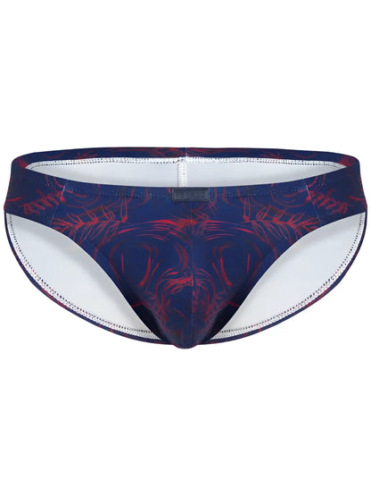 Navy blue and red tropical leaf patterned swim trunks with white lining from Clever 26029 Helion Bikini vibrant blue