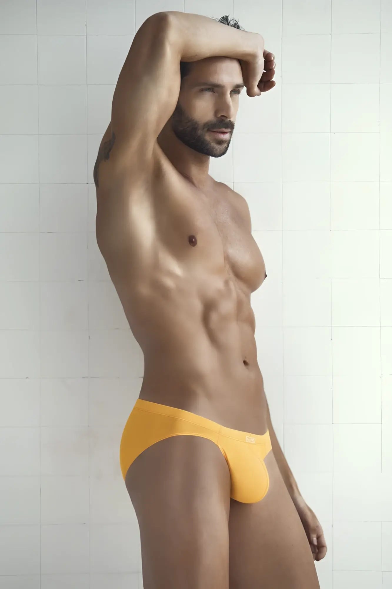 Bright yellow briefs from clever 7pk multi-colored set featuring soft breathable fabric for everyday comfort