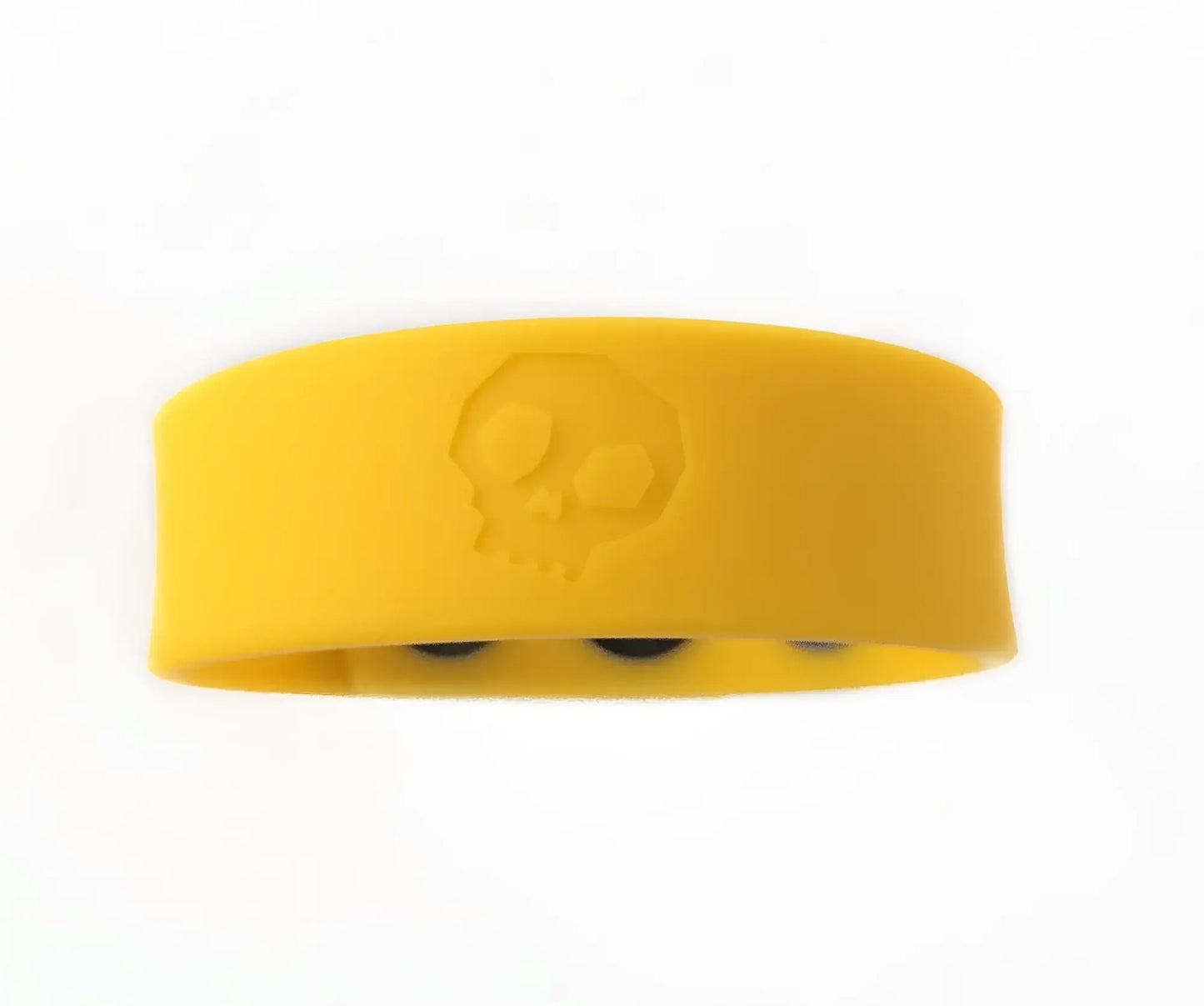 Bright yellow silicone cock strap wristband with subtle embossed skull design for edgy fashion accessory