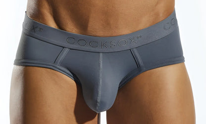 Gray cocksox cx76n supplex sports brief with smooth form-fitting design and subtle embossed waistband branding