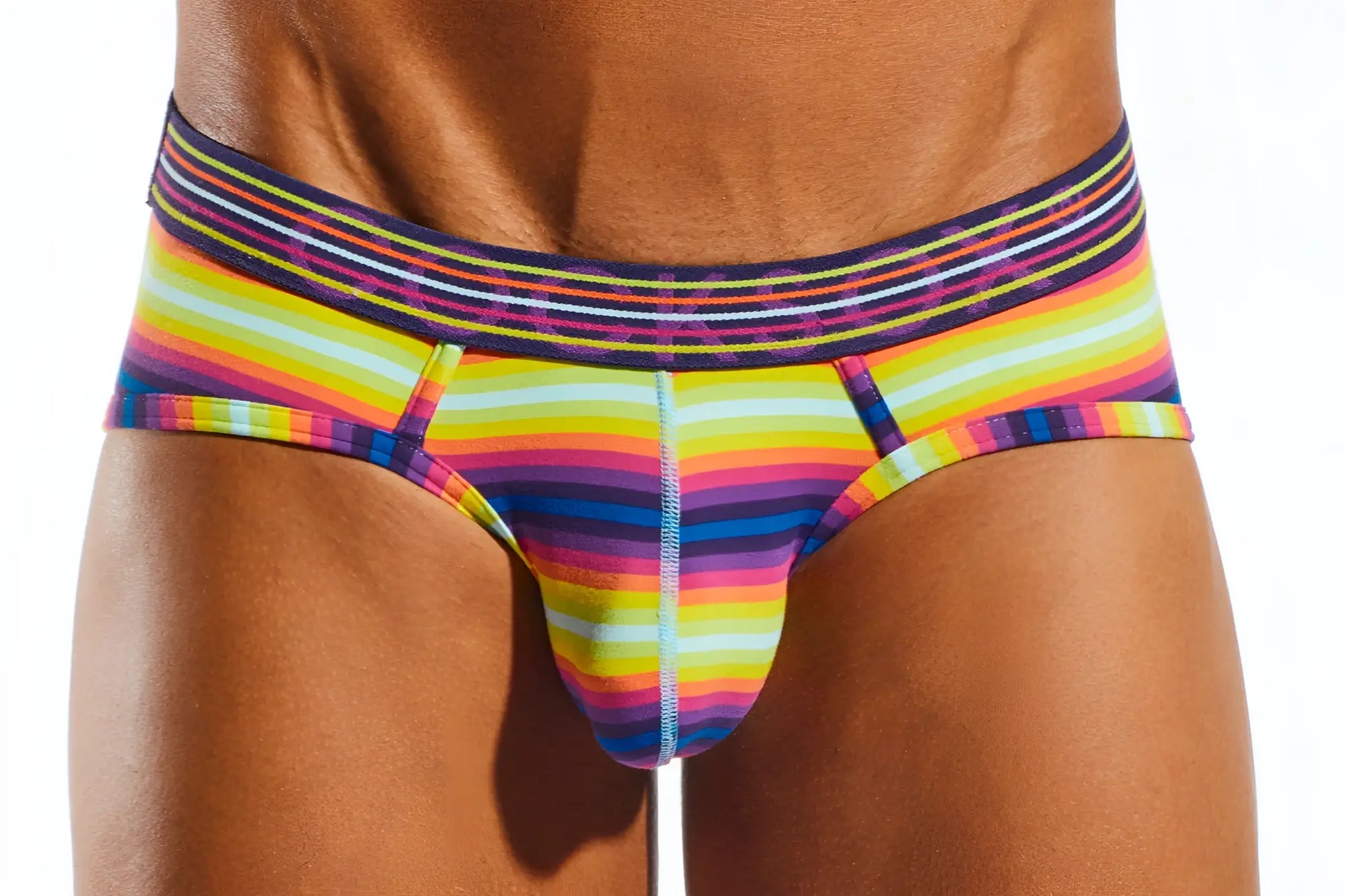 Cocksox CX76N supplex sports brief in rainbow-striped pattern with colorful bold design and elastic waistband