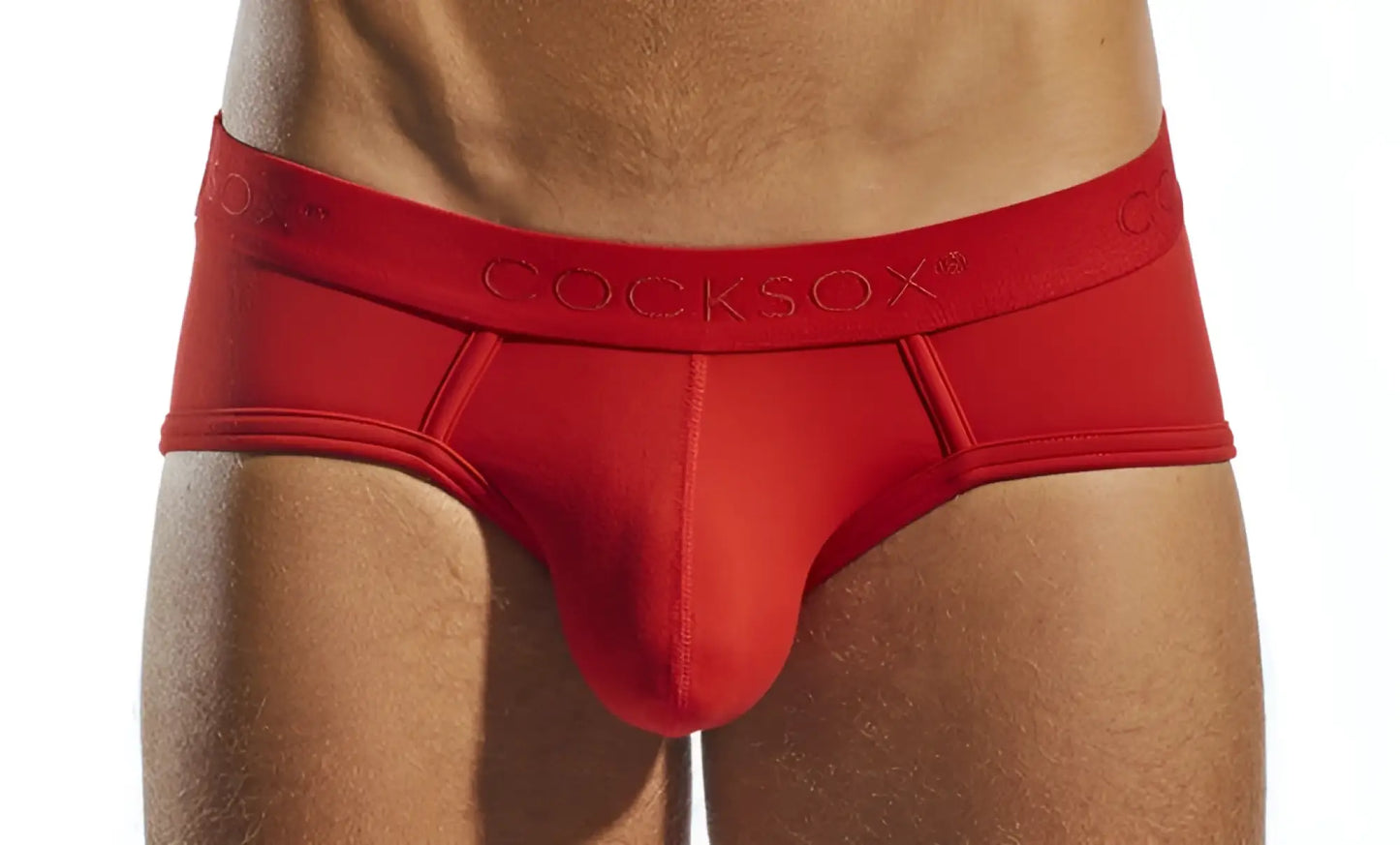 Red cocksox cx76n supplex sports brief in red with smooth form-fitting design and embroidered brand waistband