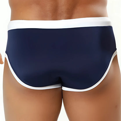 Navy blue cover male cm0706 swimwear trunks with white trim designed for comfortable beach and pool use