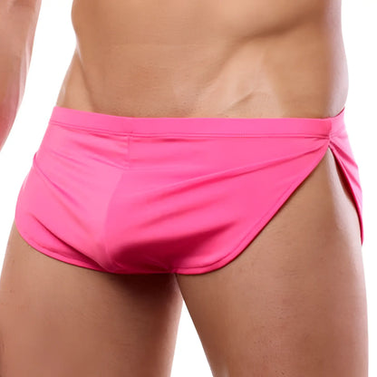 Bright pink cover male CM109 boxer swim trunks with a snug fit and side ties for comfortable wear