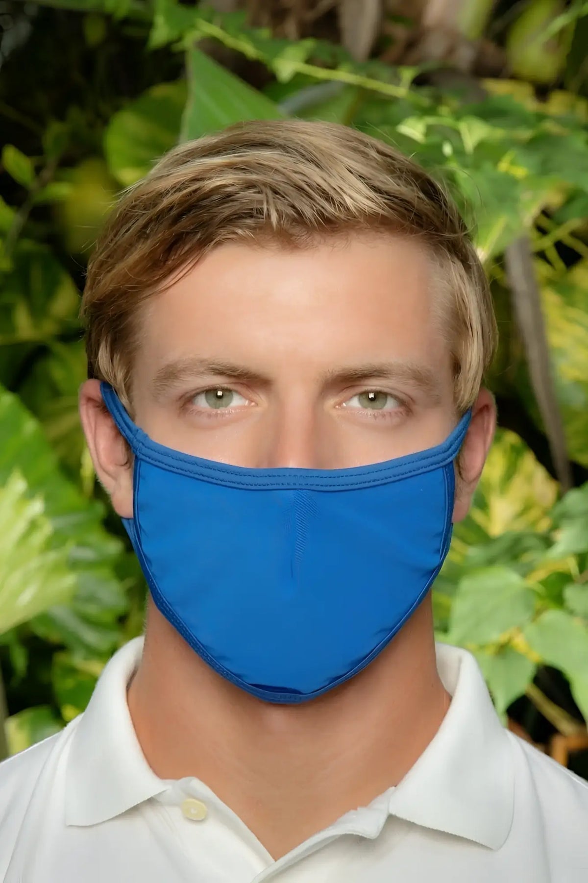 A vibrant royal blue Cover Male TAP003 fabric face mask with smooth textured surface and elastic ear loops