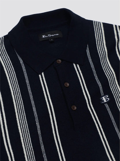Navy blue and white striped crinkle cotton polo shirt with a small embroidered logo on the chest
