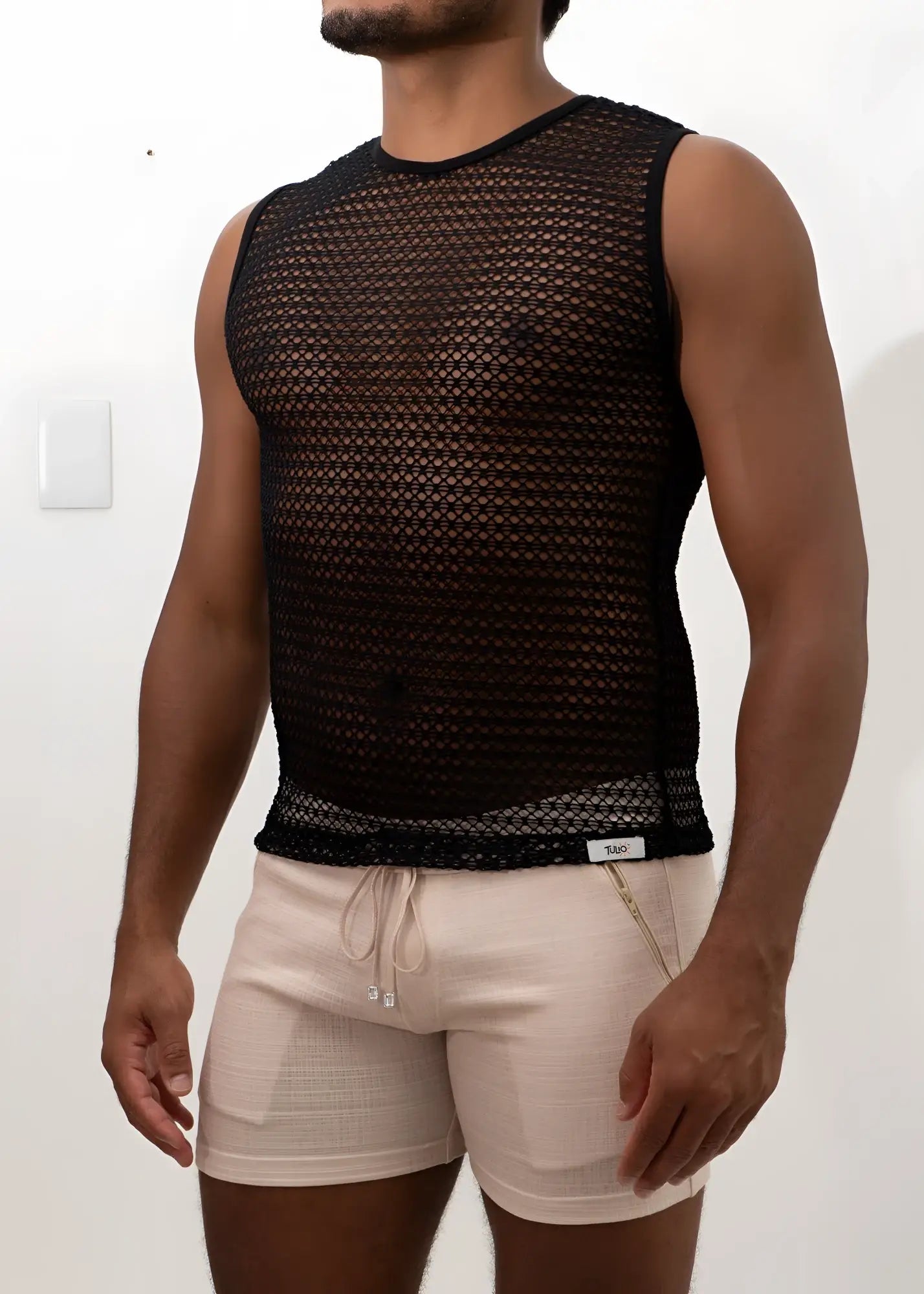 Black crochet muscle tank top with sleeveless fitted design mesh fabric and ribbed hem for casual wear
