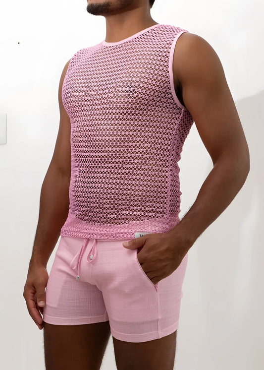 Crochet muscle tank top in pink mesh with subtle geometric pattern paired with matching pink drawstring shorts