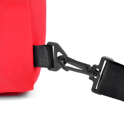 Red crossbody canvas sling bag with black webbing strap and plastic buckle for hands-free carrying
