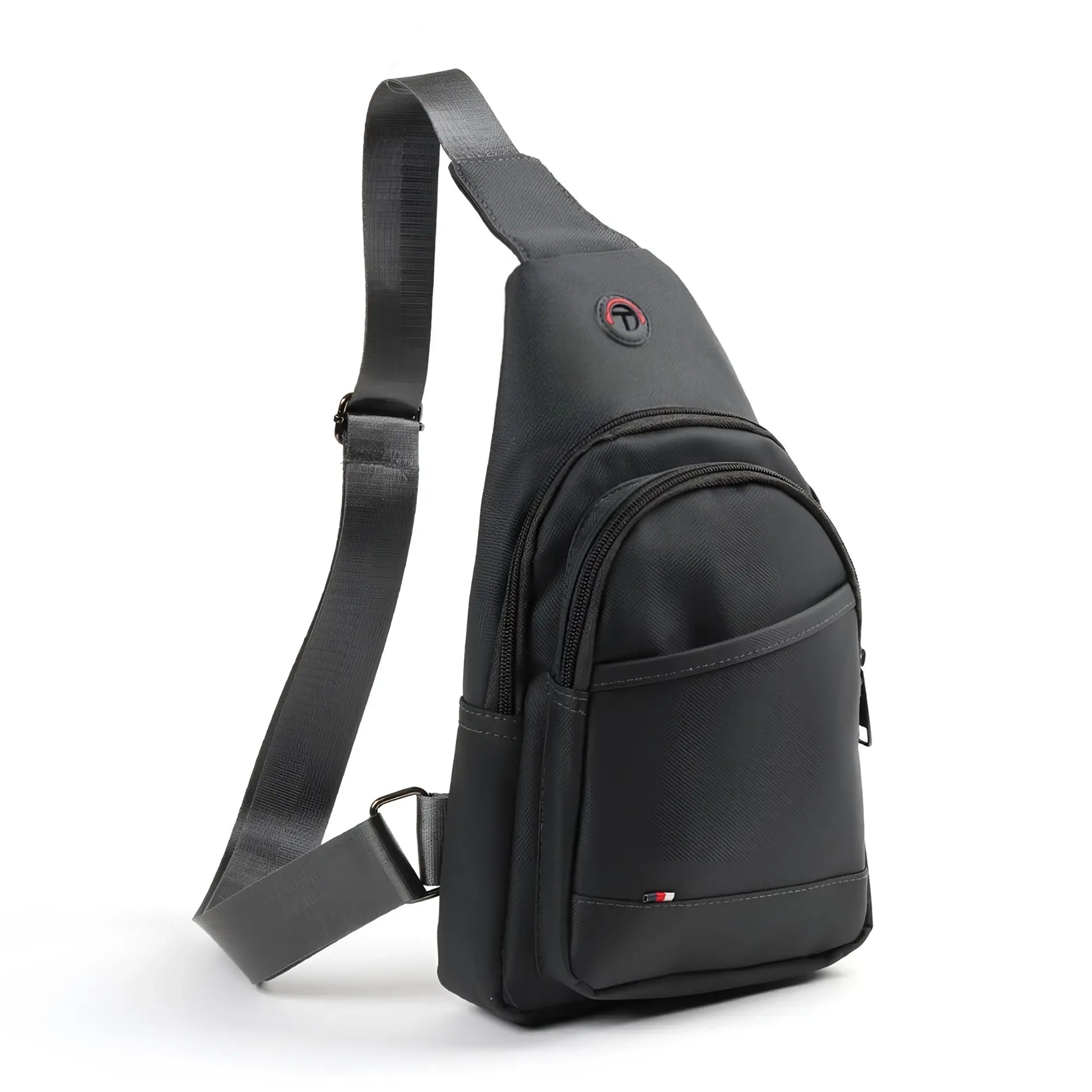 Black nylon crossbody sling bag with sleek minimalist design and subtle red logo accent for everyday use