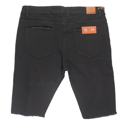 Back view of crysp denim cut off short black slim fit denim shorts with two back pockets and orange brand tags