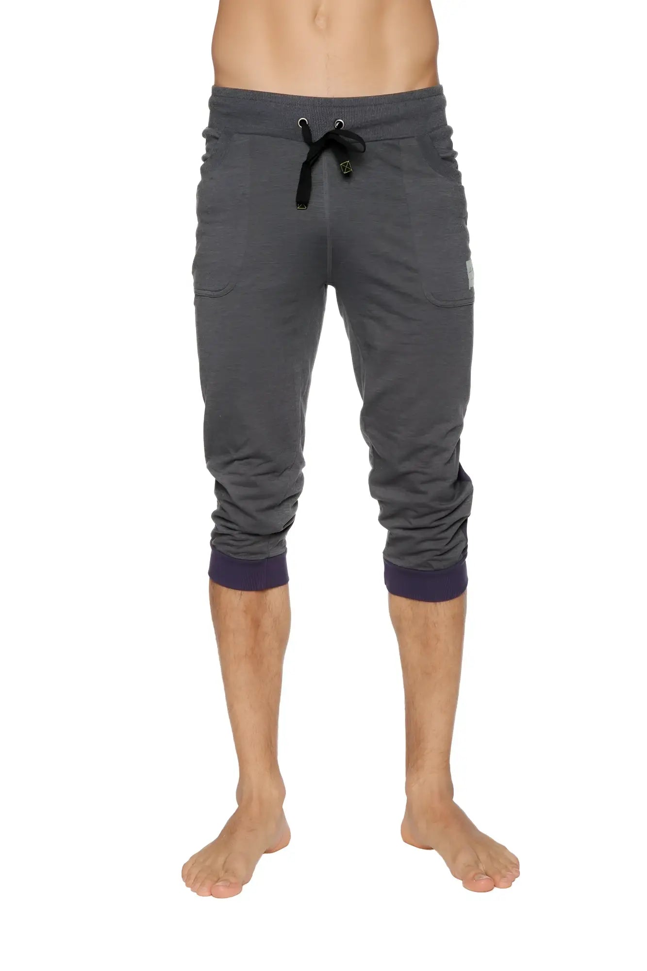 Cuffed yoga pants in charcoal with eggplant featuring dark gray heathered fabric navy ribbed cuffs and black drawstring waistband